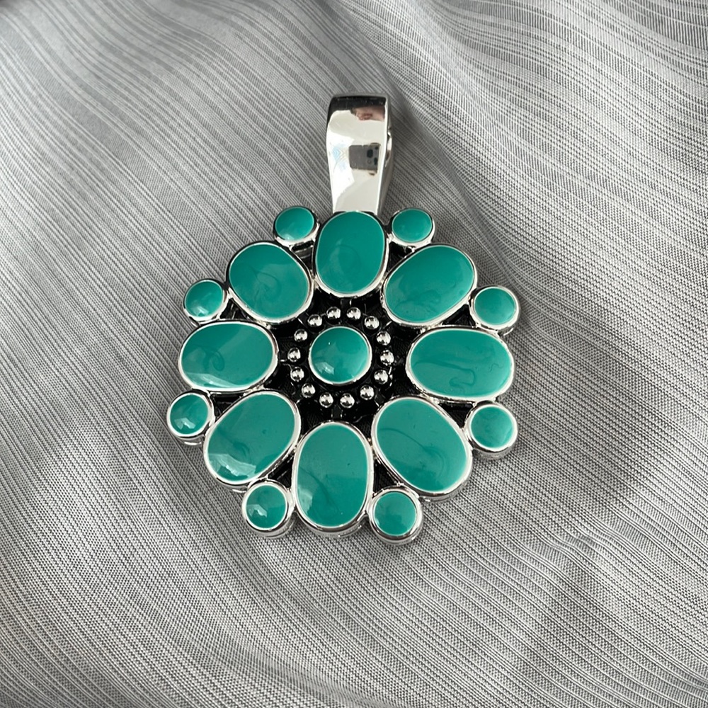 Premier design necklace pendant. Two sided. Blue and red.